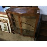 A walnut china cabinet