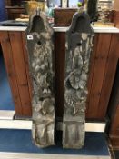 A large pair of carved wood corbels, 112cm height x 17.5cm wide