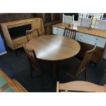 A G Plan teak circular dining table with four chairs