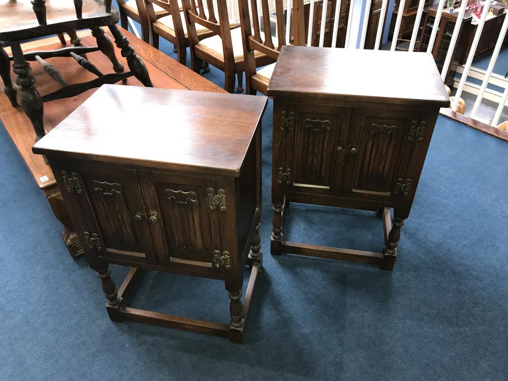 A pair of Old Charm oak linenfold cabinets, 50cm wide