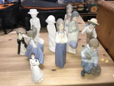 Ten various figures, to include Nao and Spode etc.