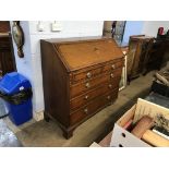 A Georgian oak fall flap bureau, 123cm wide