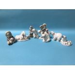 Six Lladro polar bears and two eskimo figures