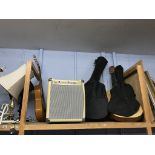 Various guitars and a speaker