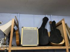 Various guitars and a speaker
