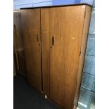 A teak double door wardrobe