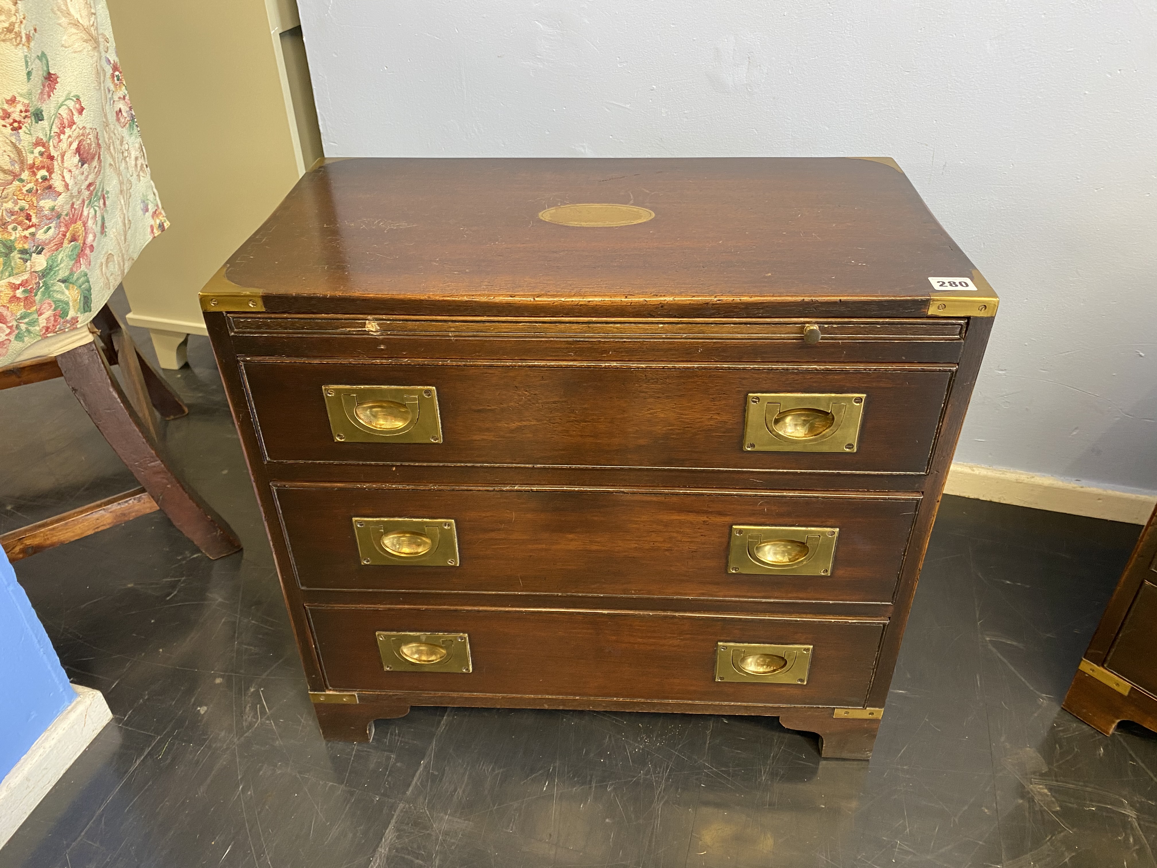 A reproduction mahogany campaign style chest of three drawers, with brushing slide, 61cm wide - Image 2 of 8