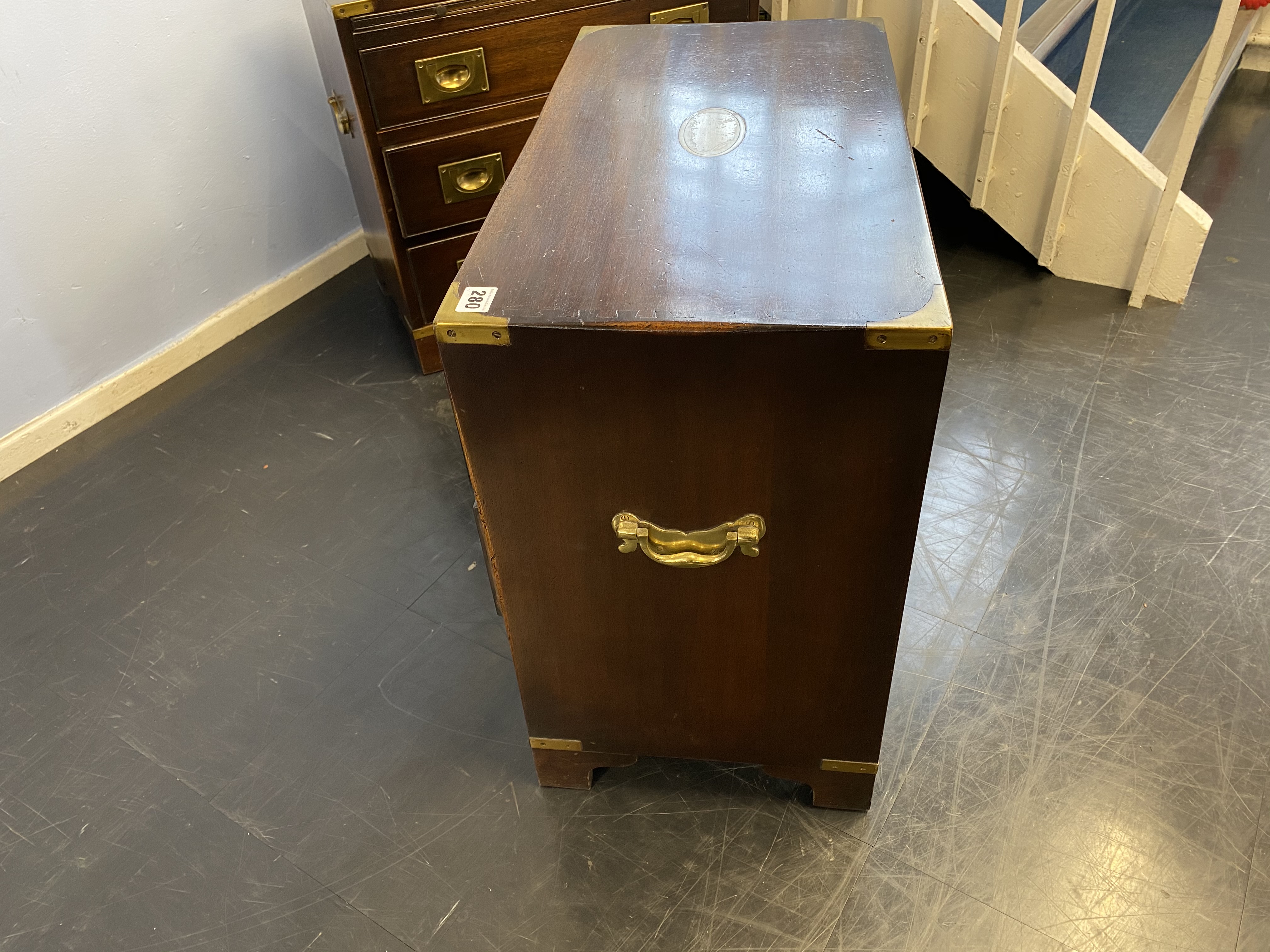 A reproduction mahogany campaign style chest of three drawers, with brushing slide, 61cm wide - Image 5 of 8