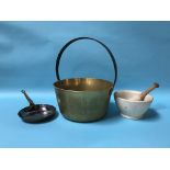 A pestle and mortar, a jam pan and a copper pan