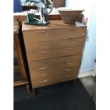 A teak chest of seven drawers, 75cm wide