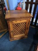 A hardwood cabinet, with lattice door, 50cm wide