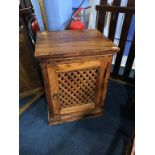 A hardwood cabinet, with lattice door, 50cm wide