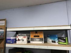 Various boxed items, to include routers and a HD box etc.