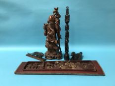 A quantity of Oriental carved wood items