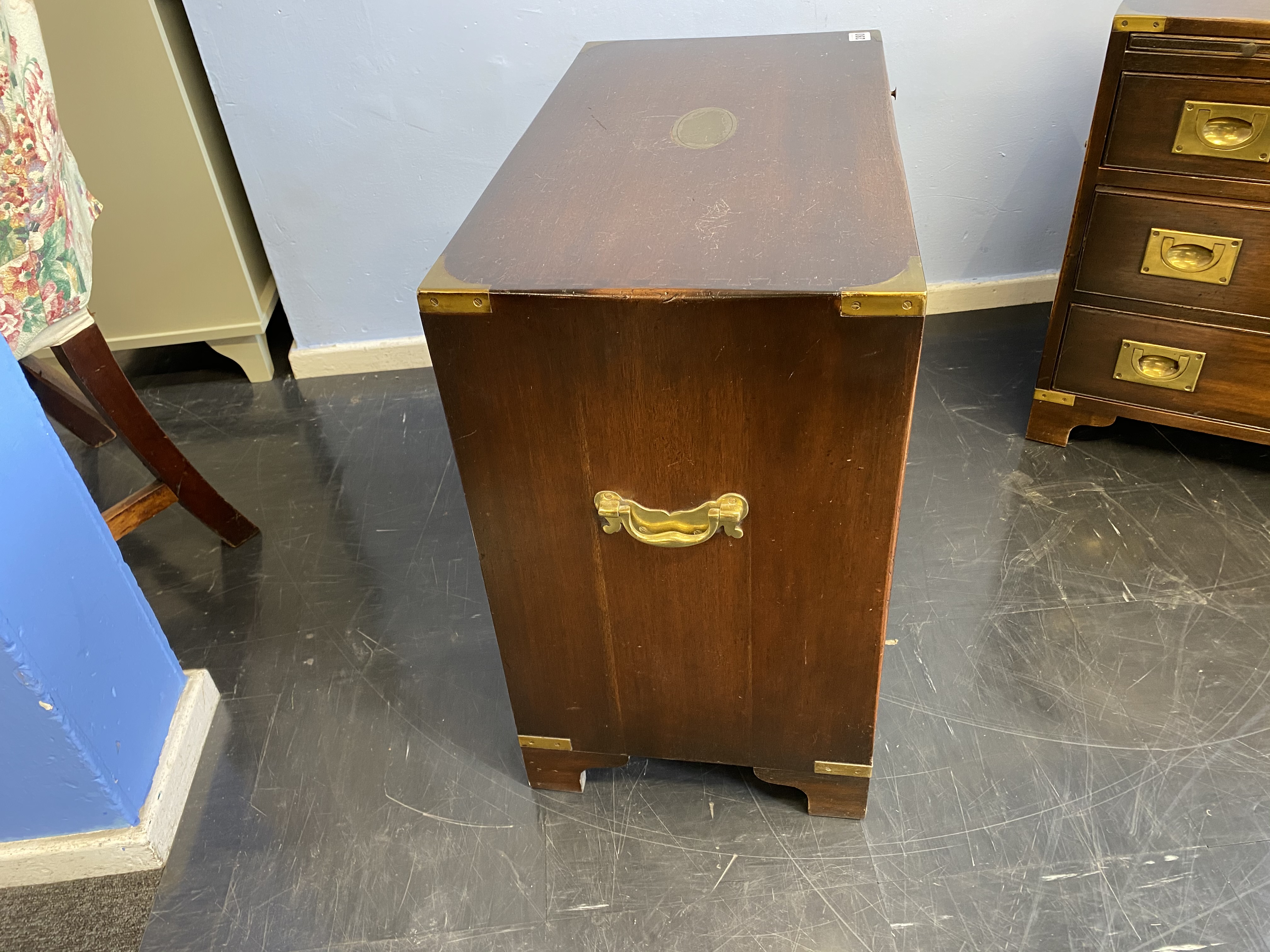 A reproduction mahogany campaign style chest of three drawers, with brushing slide, 61cm wide - Image 3 of 8