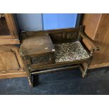 An oak 'Old Charm' telephone seat