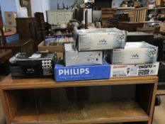 Four Walkman minidisc players, a Sharp minidisc and a Phillips portable CD (all boxed)
