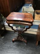 A 19th century mahogany sewing table