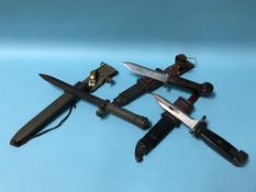 Three various bayonets