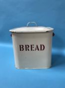 A cream enamel bread bin