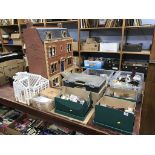 A dolls house and a large quantity of accessories