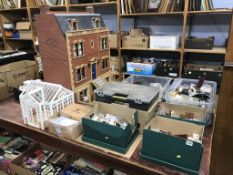 A dolls house and a large quantity of accessories