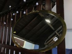 Metal framed oval mirror