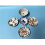 A small Chinese circular bowl, a blue and white bowl and three dishes