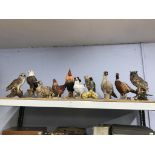 A quantity of 'Vivid Arts' bird figures