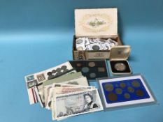 A collection of coins, to include florins, half crowns and various proof sets etc.