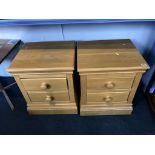 A pair of bedside drawers