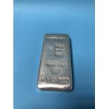 A one kilo pure silver bar and certificate