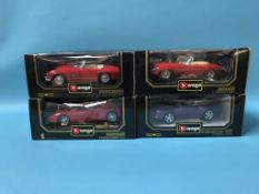 Four boxed Burago cars