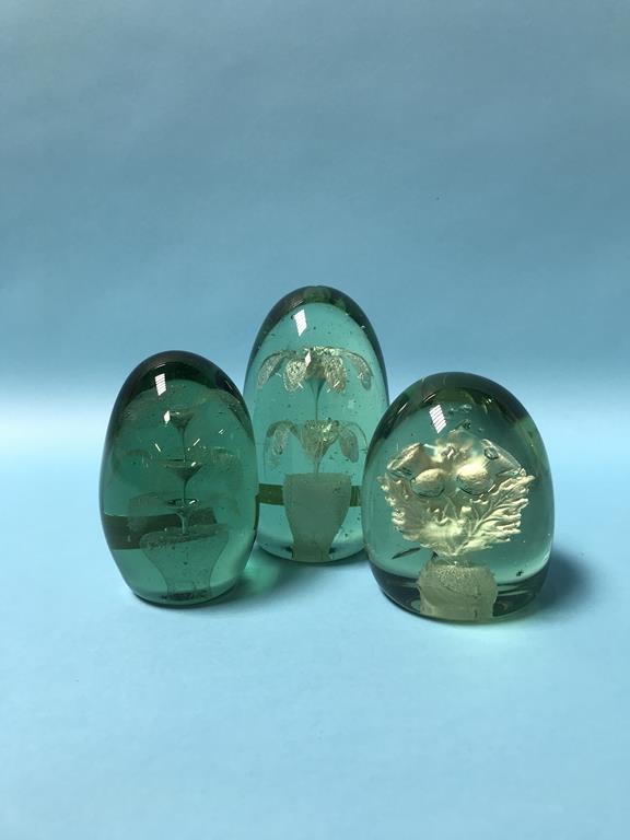 Three Victorian green glass dumps