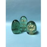 Three Victorian green glass dumps