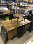 A walnut spindle back chair and a desk