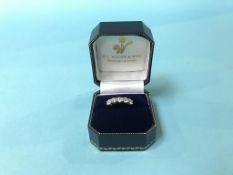 A platinum five stone diamond ring, colour GH, clarity SI1, 5g, size I