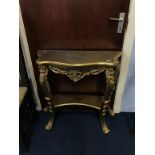 A gilt side table