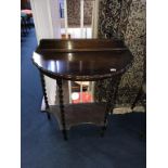 An oak half moon hall table