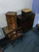A reproduction cabinet, stool, nest of tables and a miniature chest of drawers