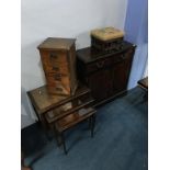 A reproduction cabinet, stool, nest of tables and a miniature chest of drawers