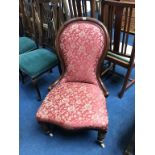 A Victorian mahogany nursing chair