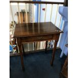 A small oak side table, with single drawer