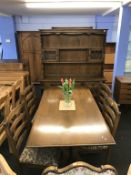 An oak Old Charm dresser, table and four chairs