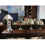 Four Tiffany style table lamps