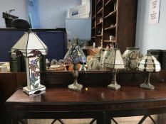 Four Tiffany style table lamps