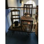 An oak barley twist umbrella stand, a chair and a coffee table