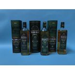 Three bottles of Bushmills 10 year old Irish whisky