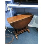 An oak barley twist gateleg table