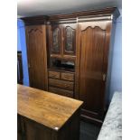 An Edwardian mahogany Compactum wardrobe